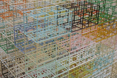 digital 3-dimensional see-through colorful cubes stacked on top of each other