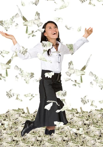 business woman with lots of money looking very happy over white
