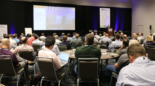 people attending a workshop at a construction estimating conference