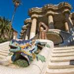 Antoni Gaudí-designed ‘el droc’ mosaic salamander at the entrance of Park Güell in Barcelona, Spain
