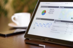 ipad showing pie chart and graph