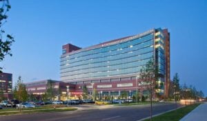 A large hospital building at dusk in Aurora, Colorado.