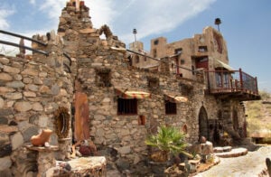 a castle made out of varying shades of beige sandstone