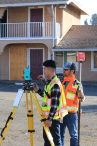 surveyors at an apartment building